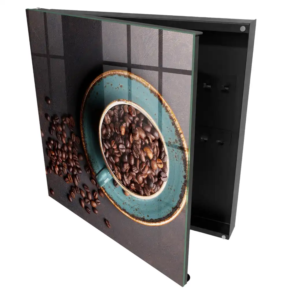 Boîte à clés une tasse avec des graines de pavot et une assiette turquoise