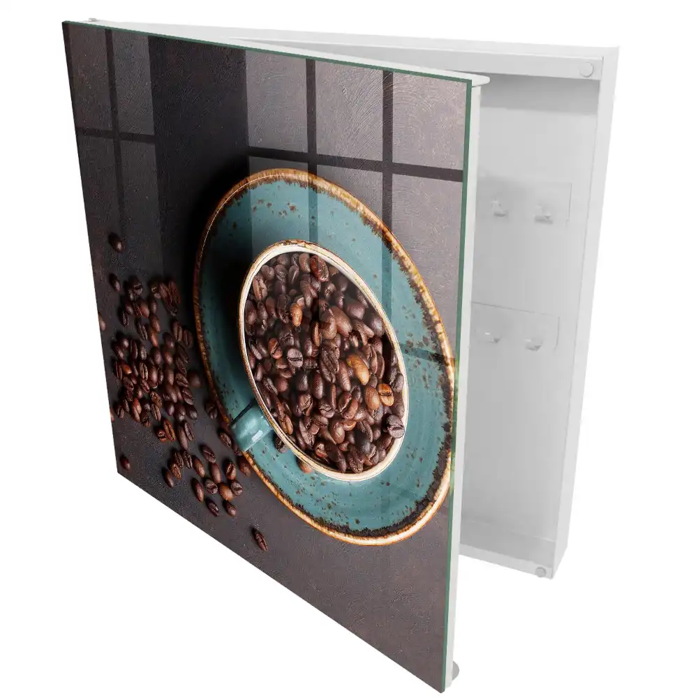 Boîte à clés une tasse avec des graines de pavot et une assiette turquoise