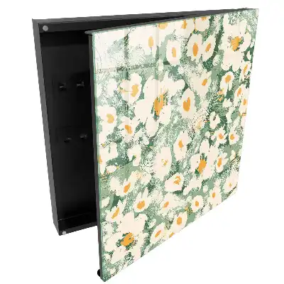 Boîte à clés fleurs sur fond vert dans un style bohème