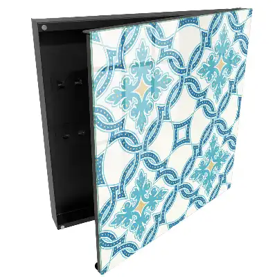 Armoire à clés motifs géométriques dans des tons turquoise