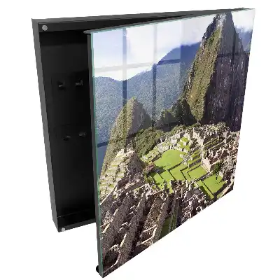 Armoire à clés montagnes majestueuses et bâtiments en pierre