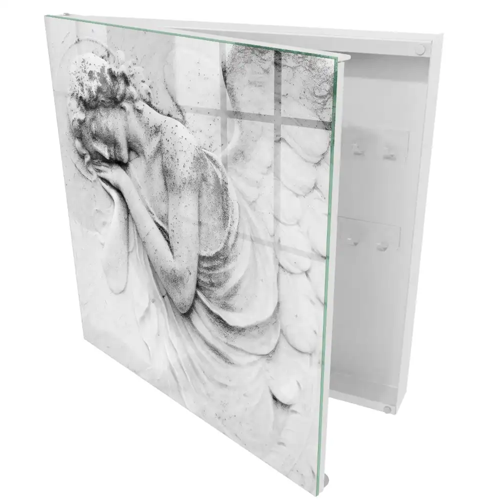 Armoire à clés relief d'un ange sur marbre