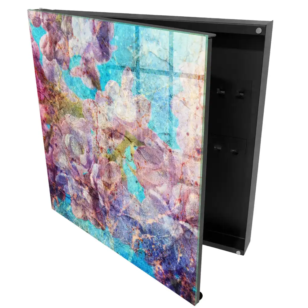 Boîte à clés murale fleurs dans des tons de violet sur fond bleu