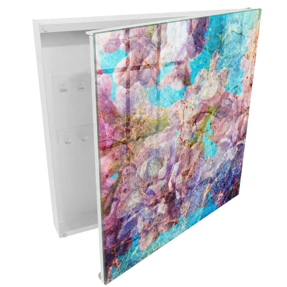 Boîte à clés murale fleurs dans des tons de violet sur fond bleu