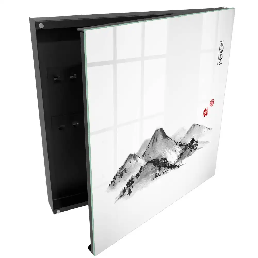 Armoire à clés montagnes noires et blanches avec des touches de rouge
