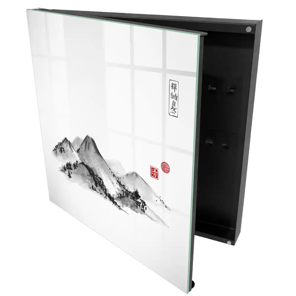 Armoire à clés montagnes noires et blanches avec des touches de rouge