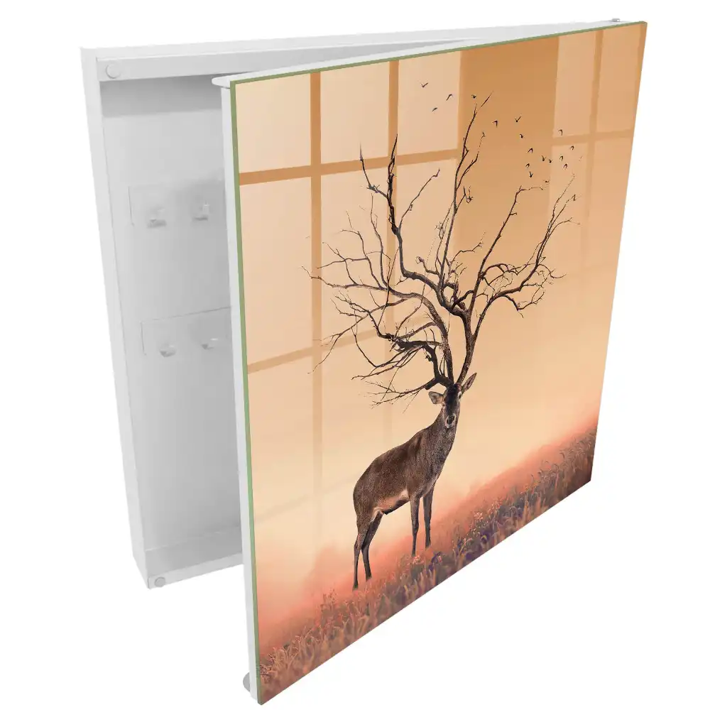 Boîte à clés un cerf magique sur fond de brouillard orangé