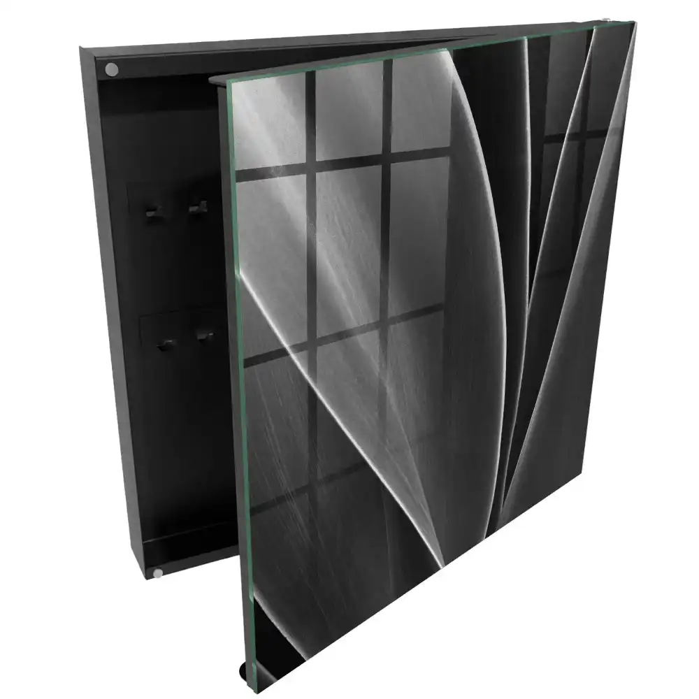 Armoire à clés feuilles noires et blanches dans une composition élégante