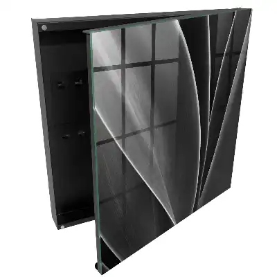 Armoire à clés feuilles noires et blanches dans une composition élégante