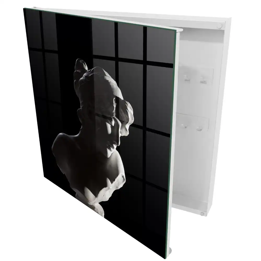 Boîte à clés murale l'élégance de la sculpture dans la lumière et l'ombre