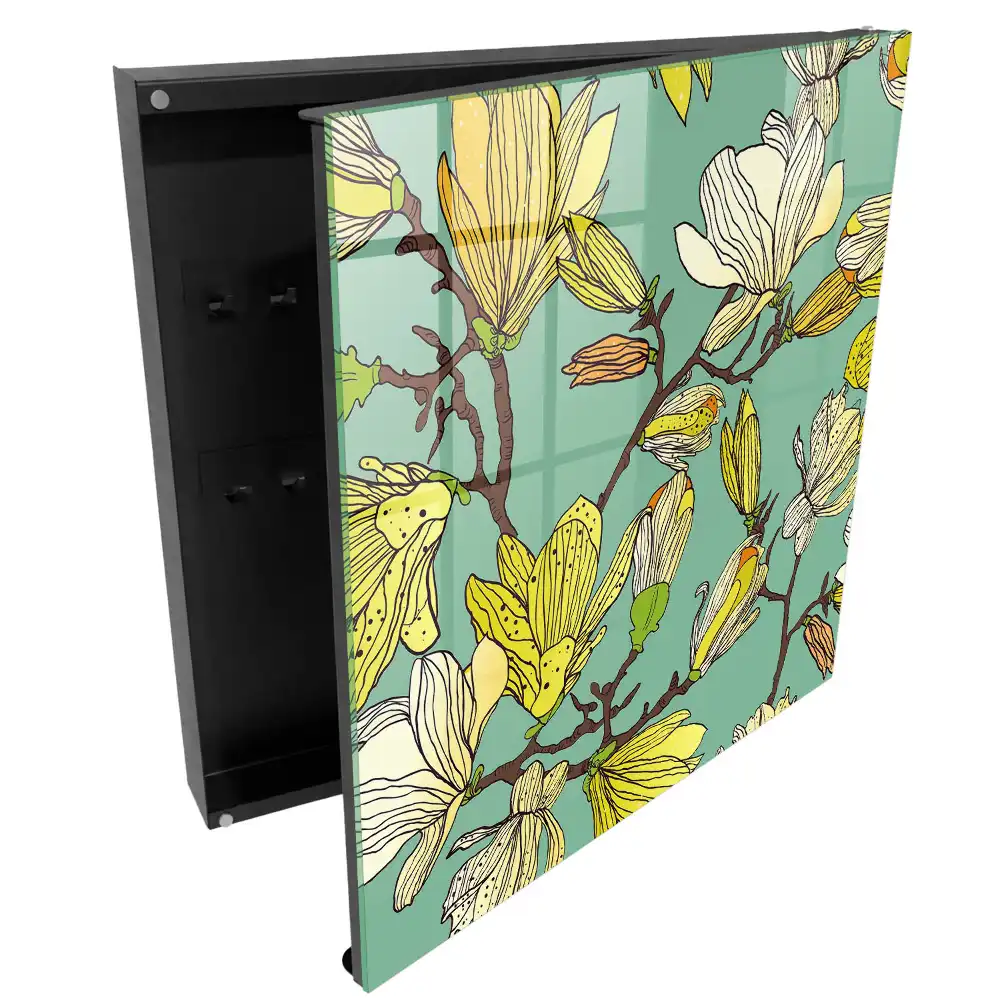 Armoire à clés magnolias jaunes sur fond vert