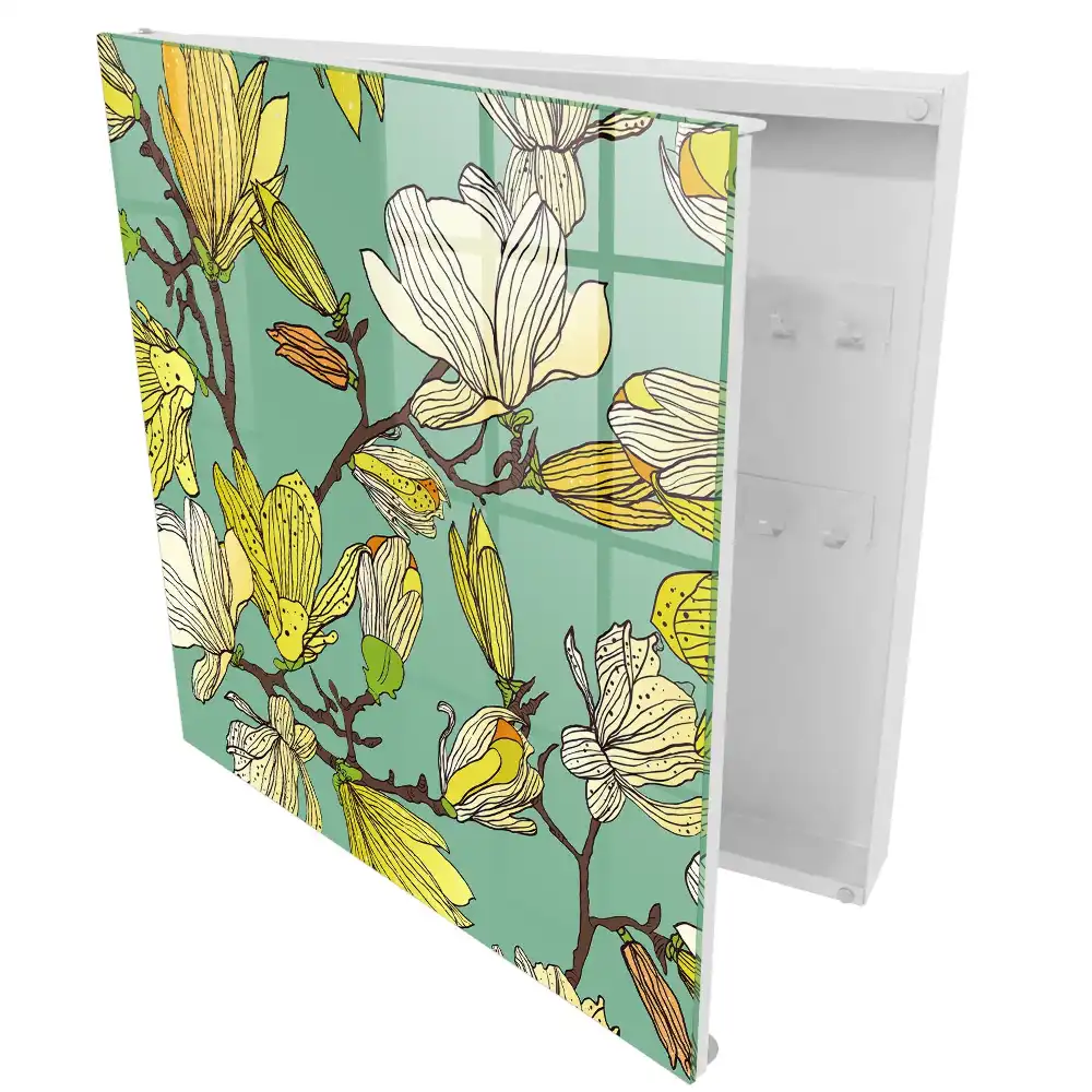 Armoire à clés magnolias jaunes sur fond vert