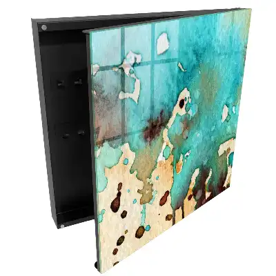Armoire à clés des taches turquoise et brunes dans une composition abstraite