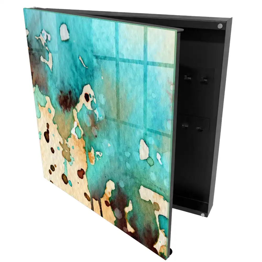 Armoire à clés des taches turquoise et brunes dans une composition abstraite
