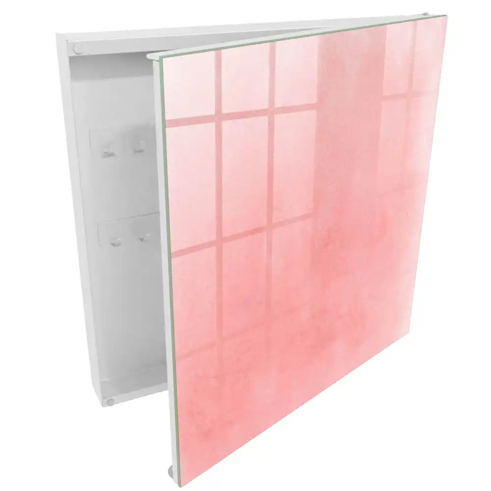Boîte à clés murale fond rose délicat avec un motif subtil