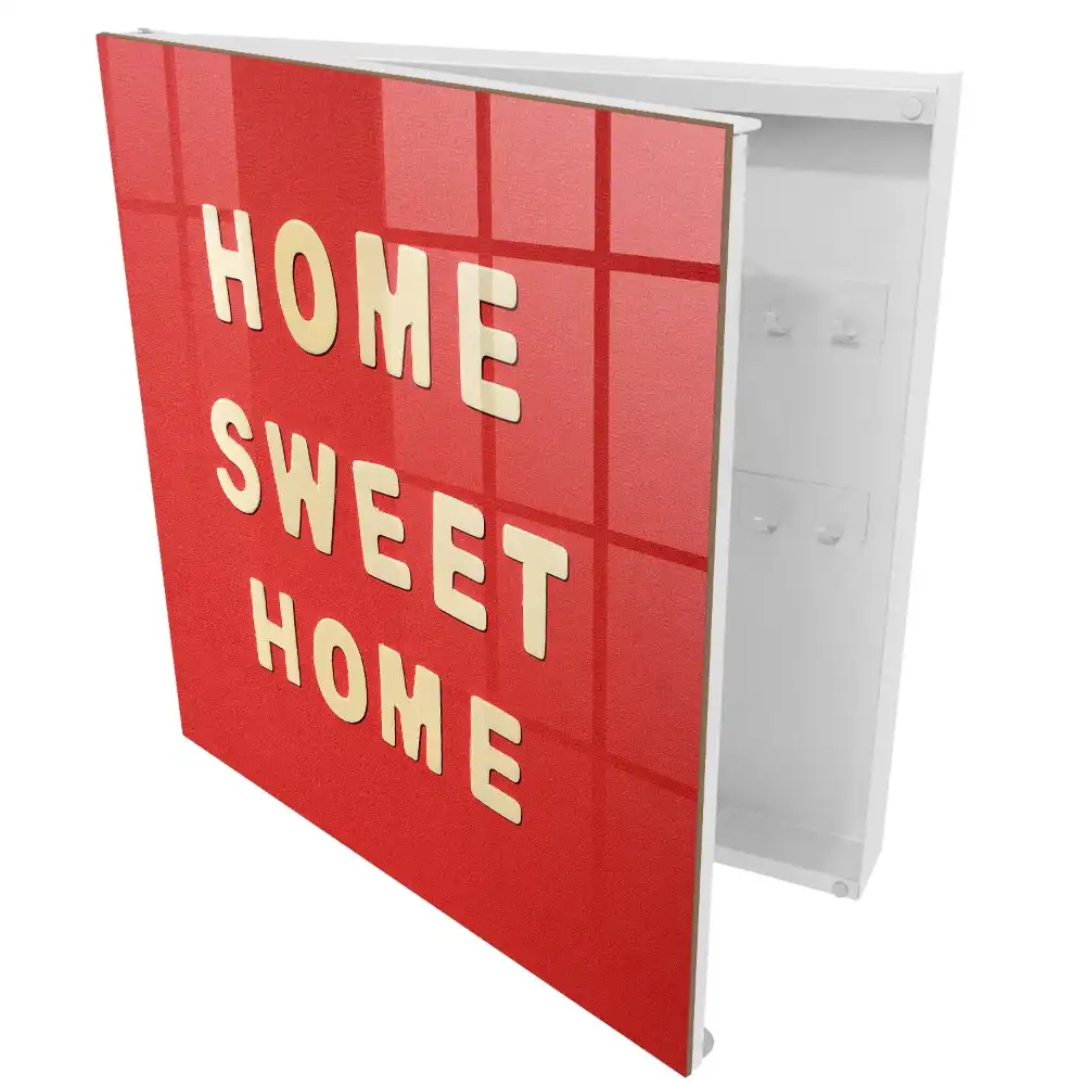 Boîte à clés murale l'inscription HOME SWEET HOME sur fond rouge