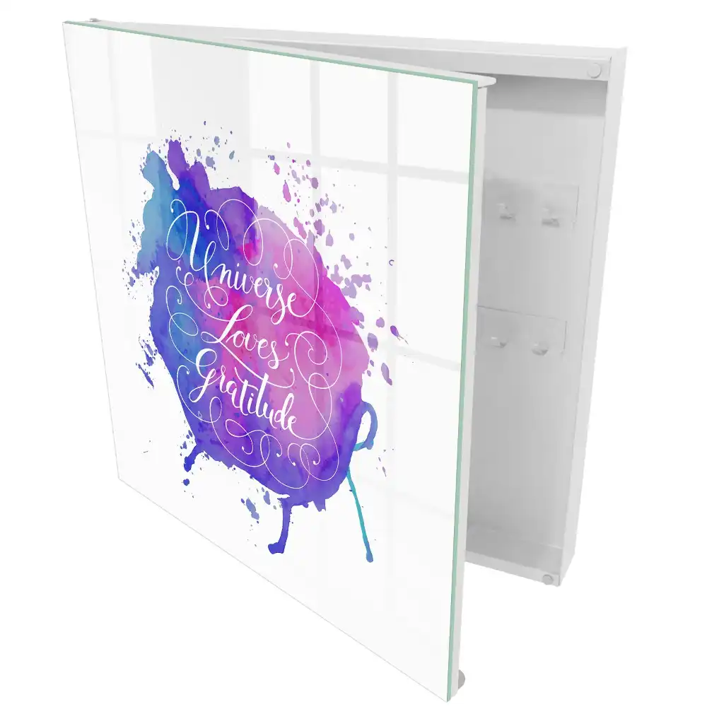 Boîte à clés aquarelle avec une inscription en violet et rose