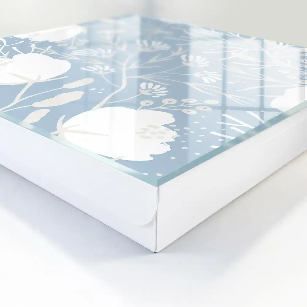 Boîte à clés murale motifs floraux sur fond bleu clair
