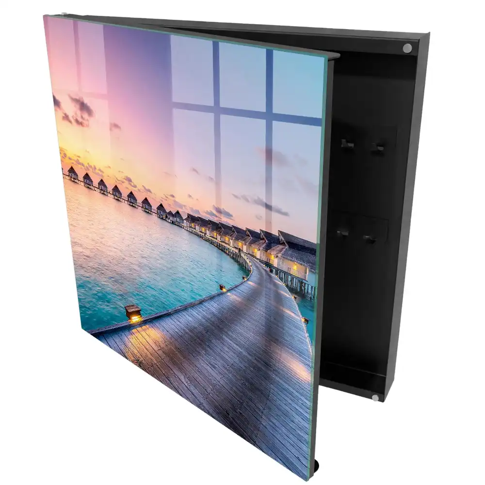 Armoire à clés coucher de soleil sur les maisons au bord de l'eau