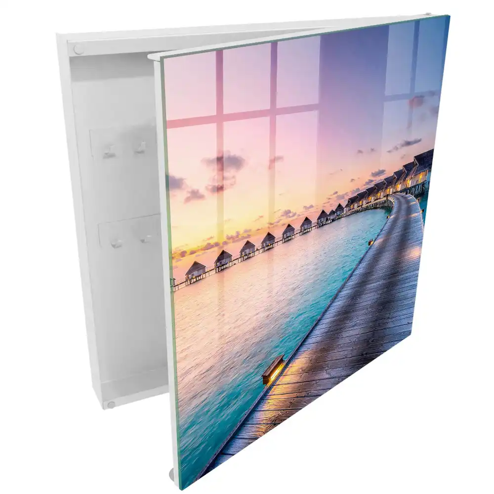 Armoire à clés coucher de soleil sur les maisons au bord de l'eau
