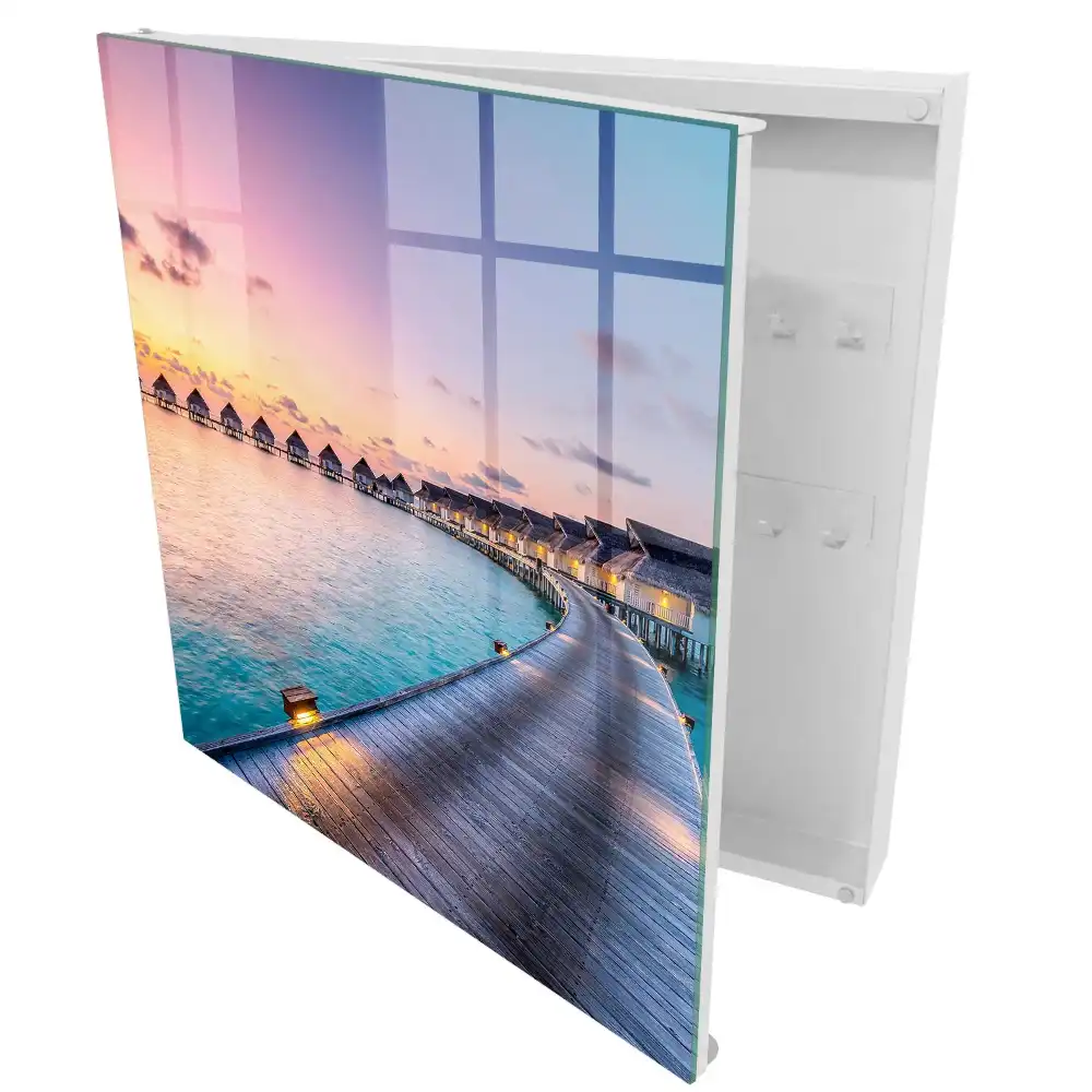 Armoire à clés coucher de soleil sur les maisons au bord de l'eau