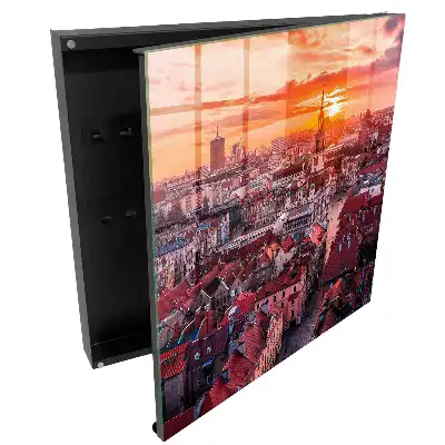 Armoire à clés un coucher de soleil chaleureux sur les toits historiques de la ville