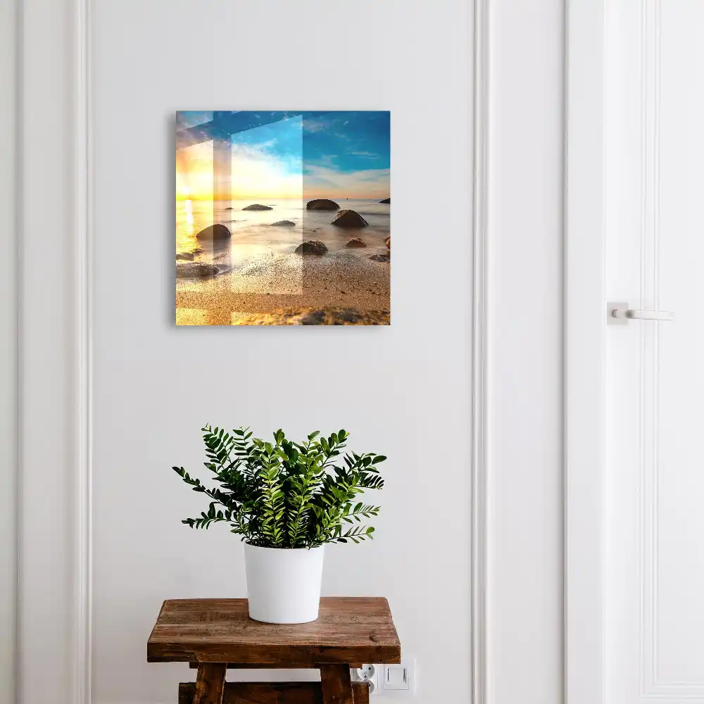 Boîte à clés murale coucher de soleil sur la mer avec des pierres