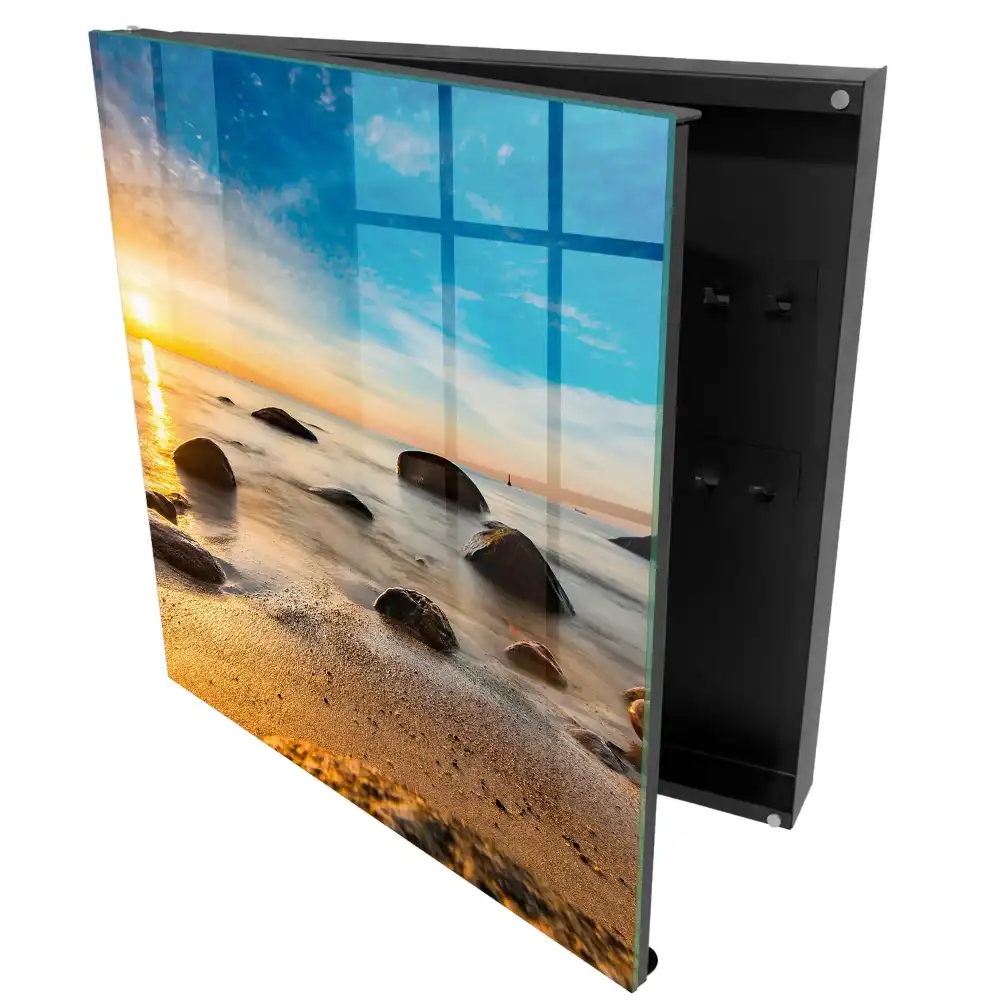 Boîte à clés murale coucher de soleil sur la mer avec des pierres