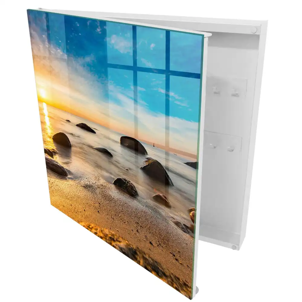 Boîte à clés murale coucher de soleil sur la mer avec des pierres