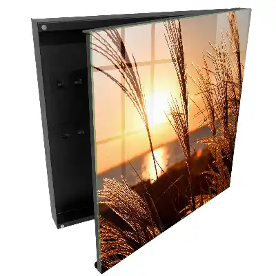 Boîte à clés murale coucher de soleil sur la mer avec des herbes