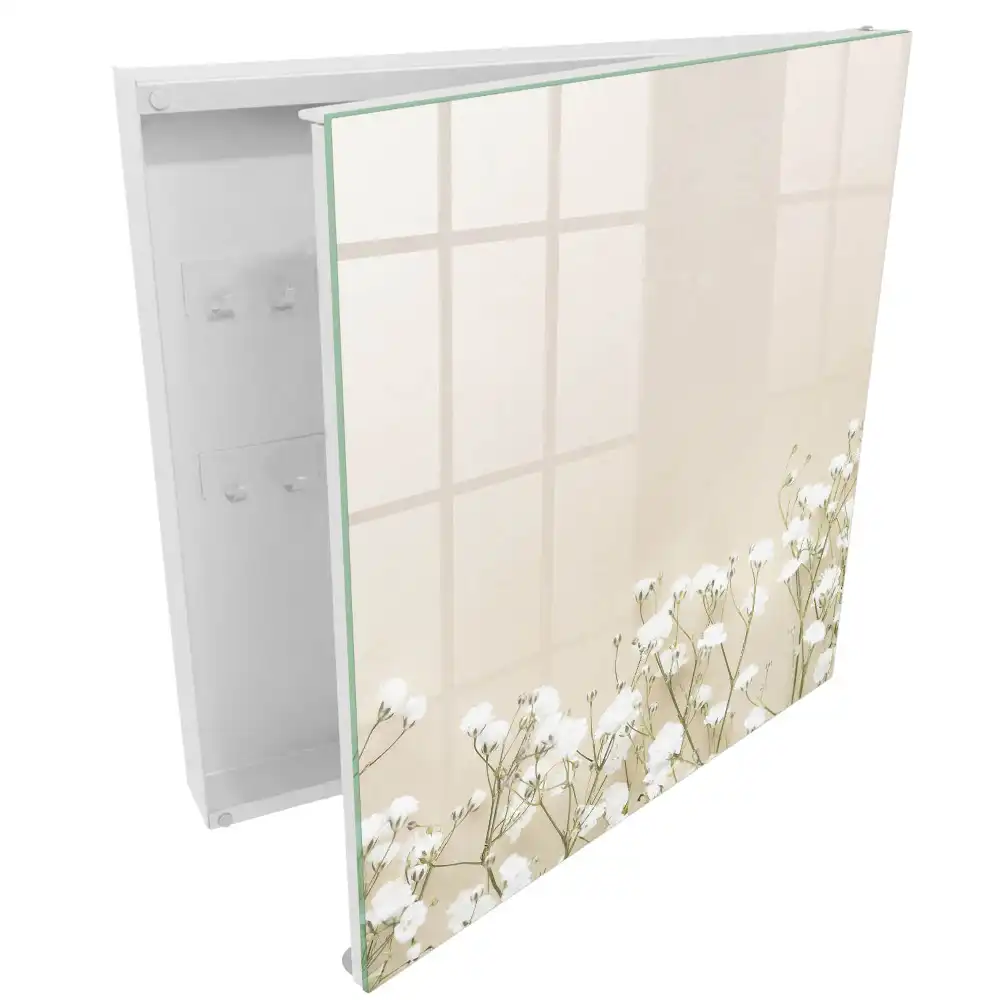 Boîte à clés délicates fleurs blanches sur fond beige
