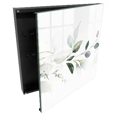 Armoire à clés motifs végétaux aux tons pastel et blancs
