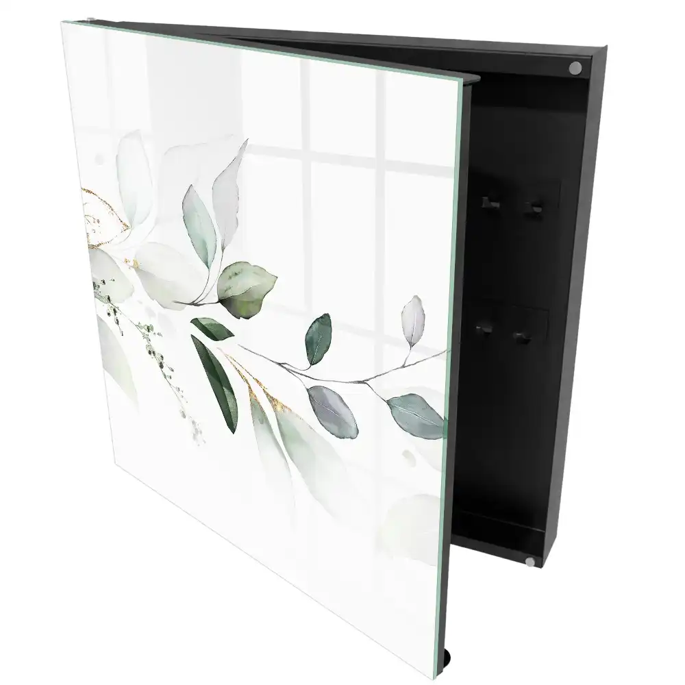 Armoire à clés motifs végétaux aux tons pastel et blancs