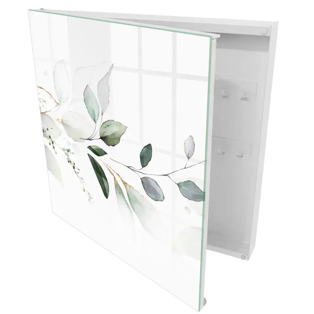 Armoire à clés motifs végétaux aux tons pastel et blancs