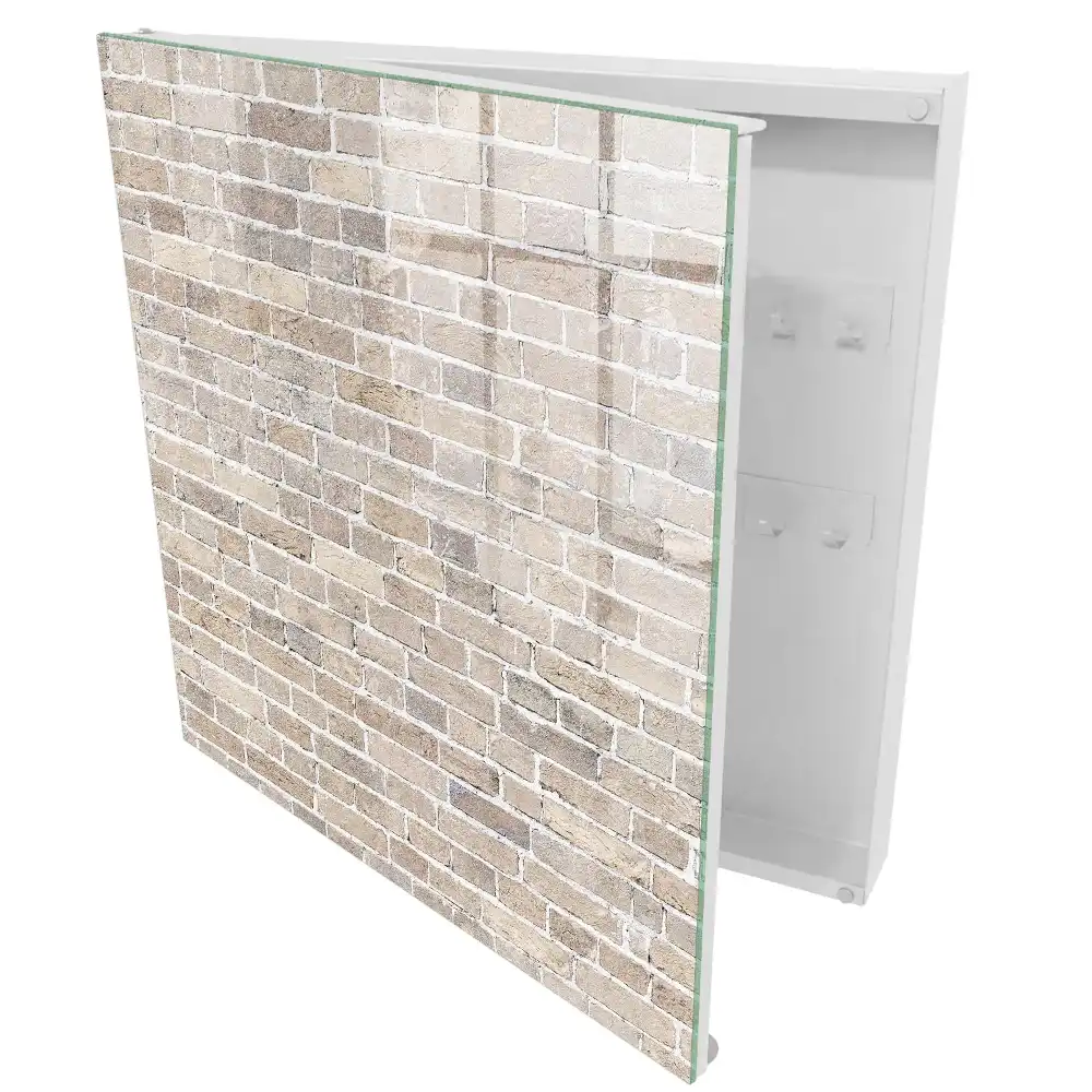 Armoire à clés mur de briques dans des tons de beige et de gris