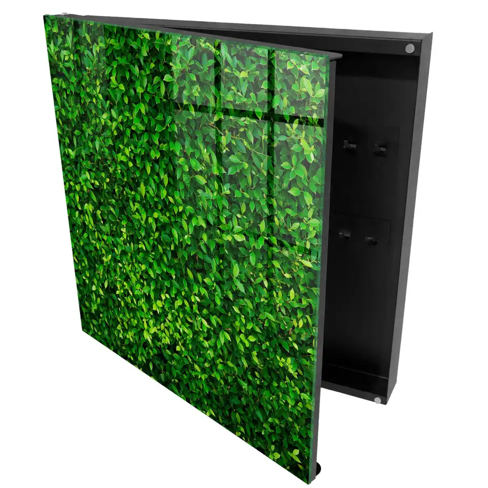Boîte à clés murale un mur vert couvert de feuilles assure la paix