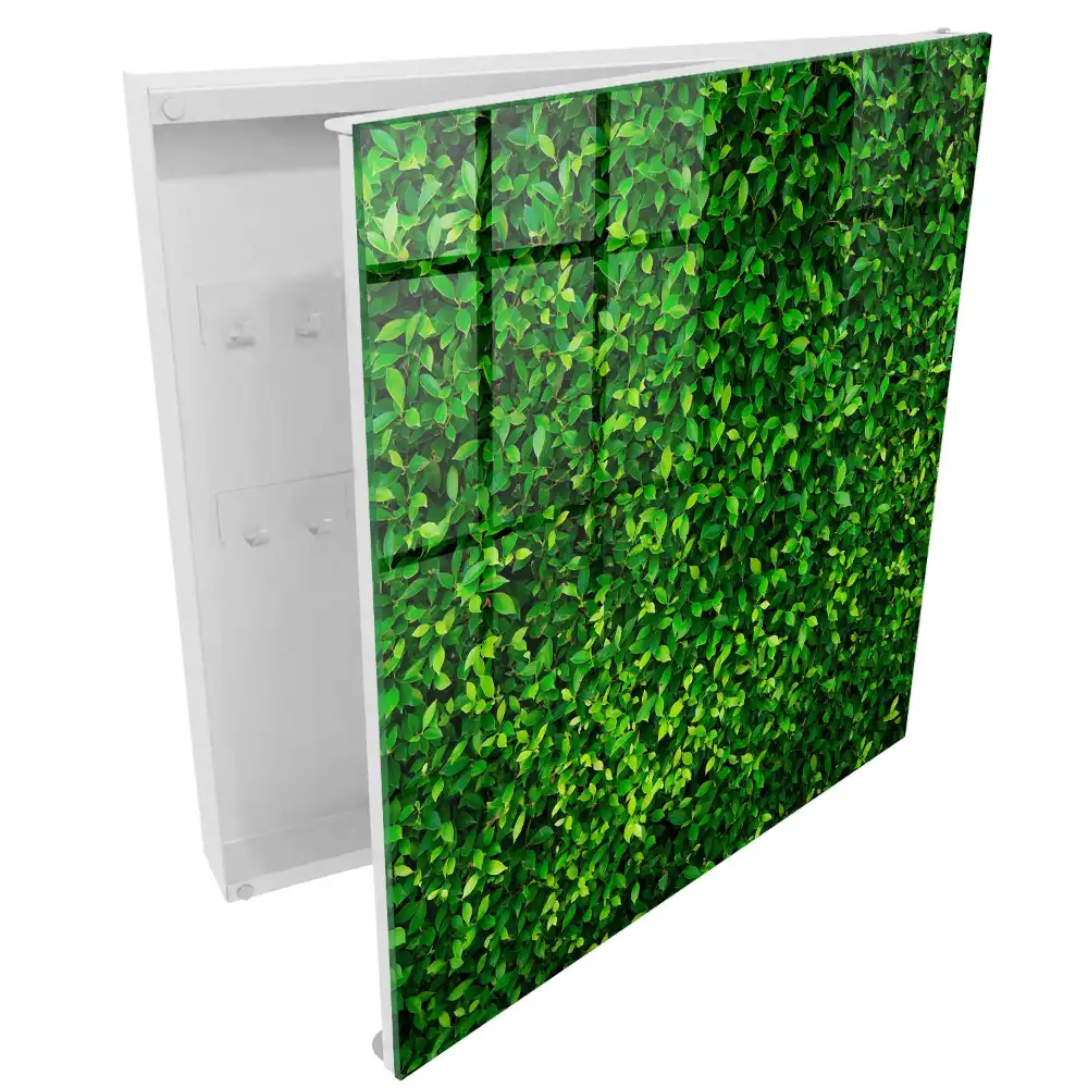 Boîte à clés murale un mur vert couvert de feuilles assure la paix