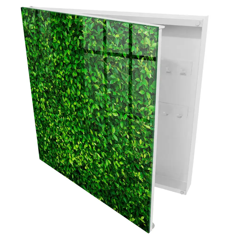 Boîte à clés murale un mur vert couvert de feuilles assure la paix