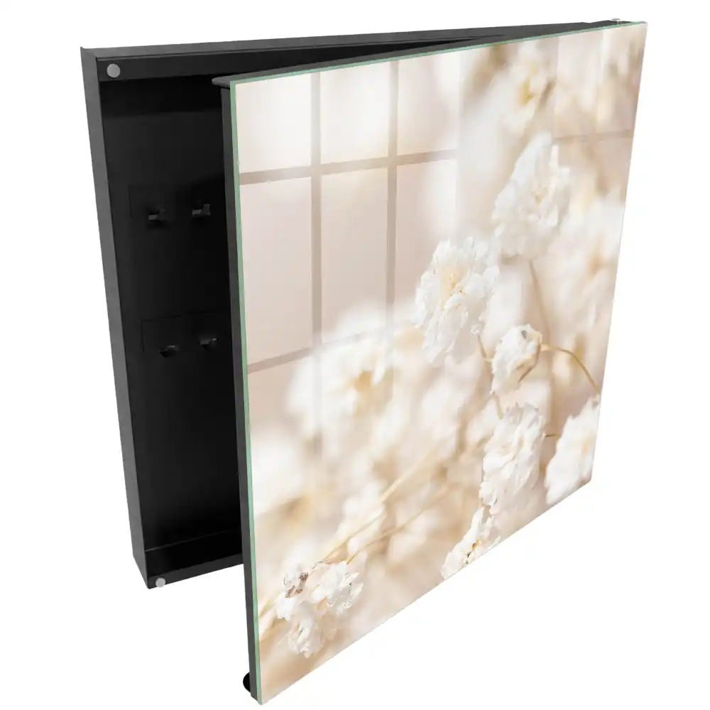 Armoire à clés fleurs délicates dans des tons clairs