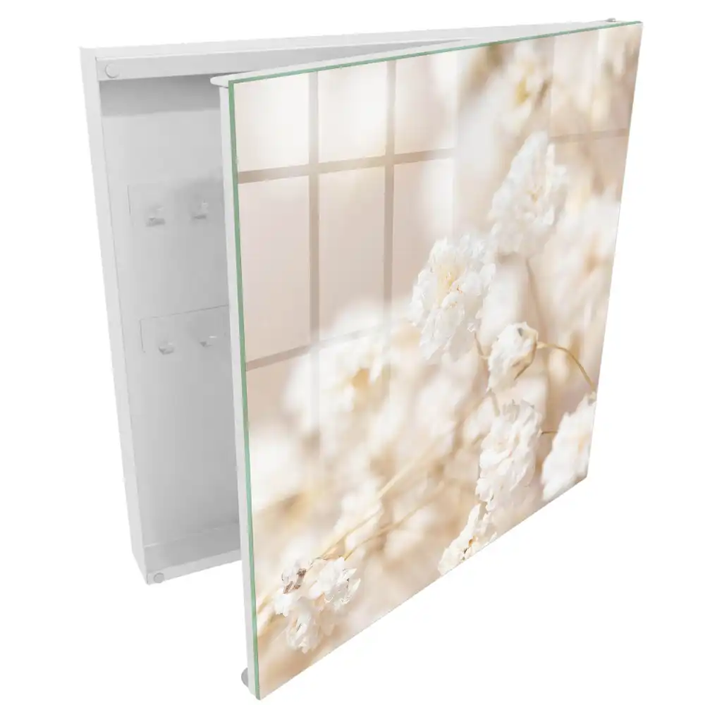 Armoire à clés fleurs délicates dans des tons clairs
