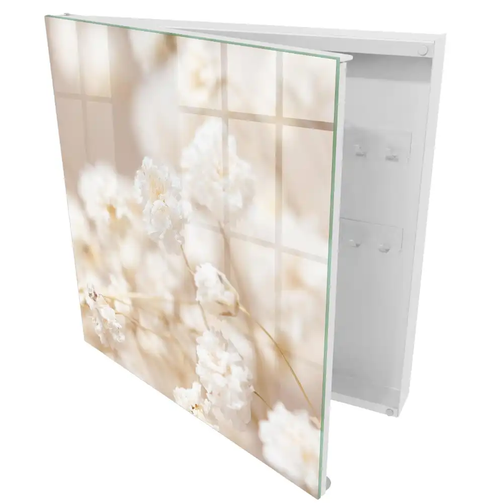 Armoire à clés fleurs délicates dans des tons clairs