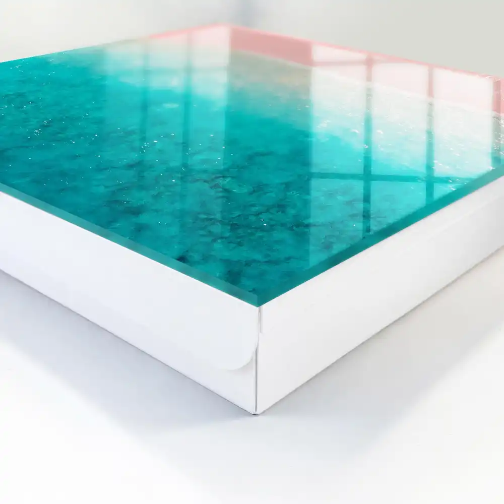 Armoire à clés rivage aux teintes pastel sable rose et mer turquoise