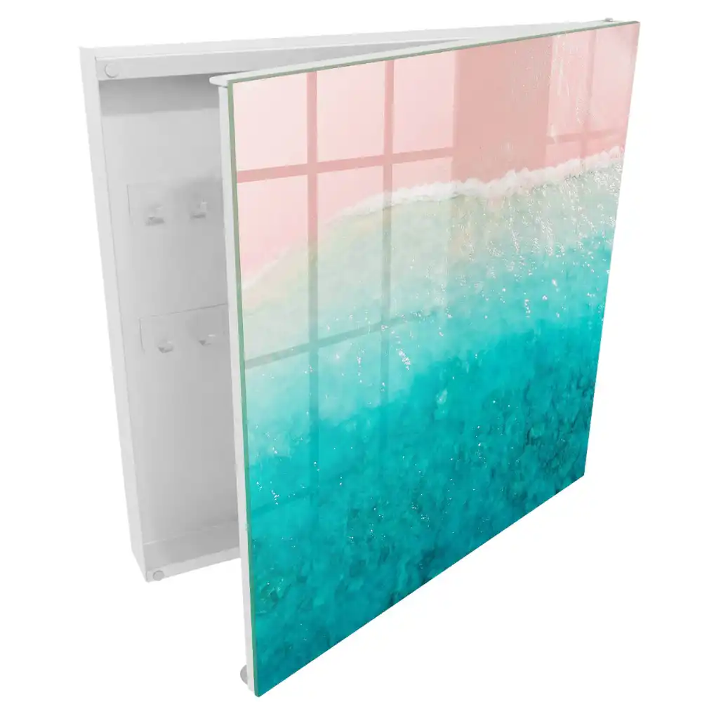 Armoire à clés rivage aux teintes pastel sable rose et mer turquoise