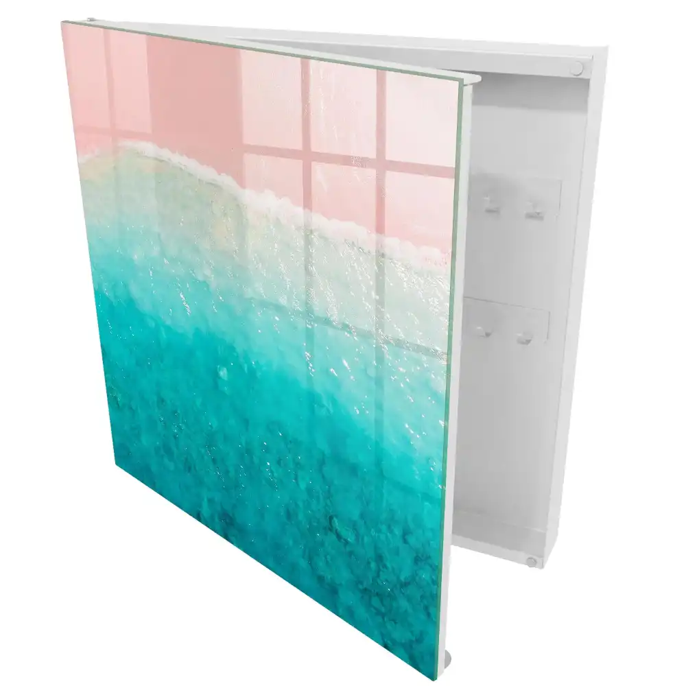 Armoire à clés rivage aux teintes pastel sable rose et mer turquoise