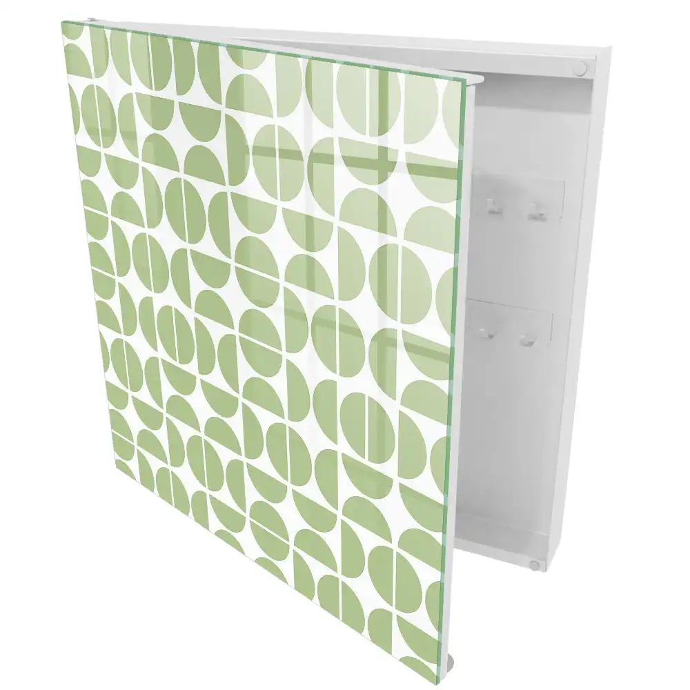 Armoire à clés motifs géométriques verts sur fond blanc
