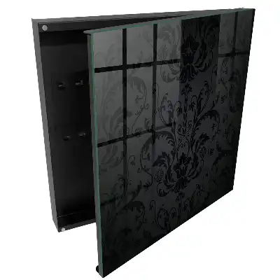 Boîte à clés un motif délicat noir et gris avec une note florale