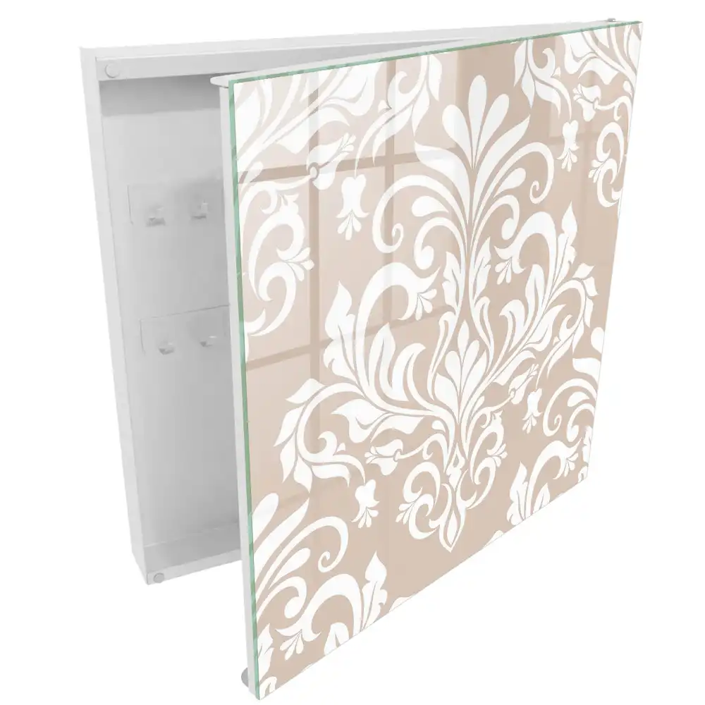 Armoire à clés fond beige motifs symétriques blancs élégants
