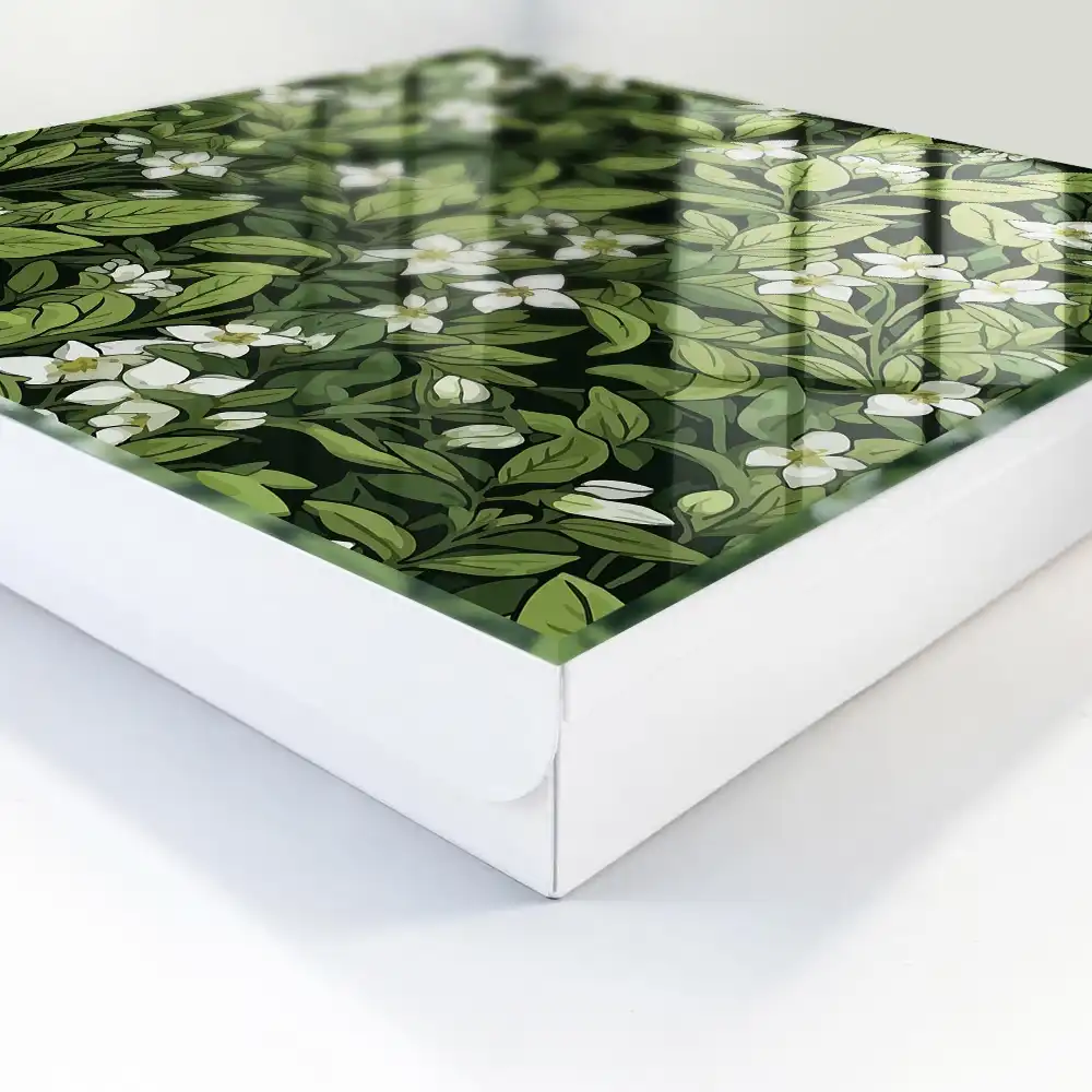Boîte à clés feuilles vertes et fleurs blanches pleines de vie