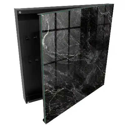 Armoire à clés surface noire veinée de blanc évoquant le marbre