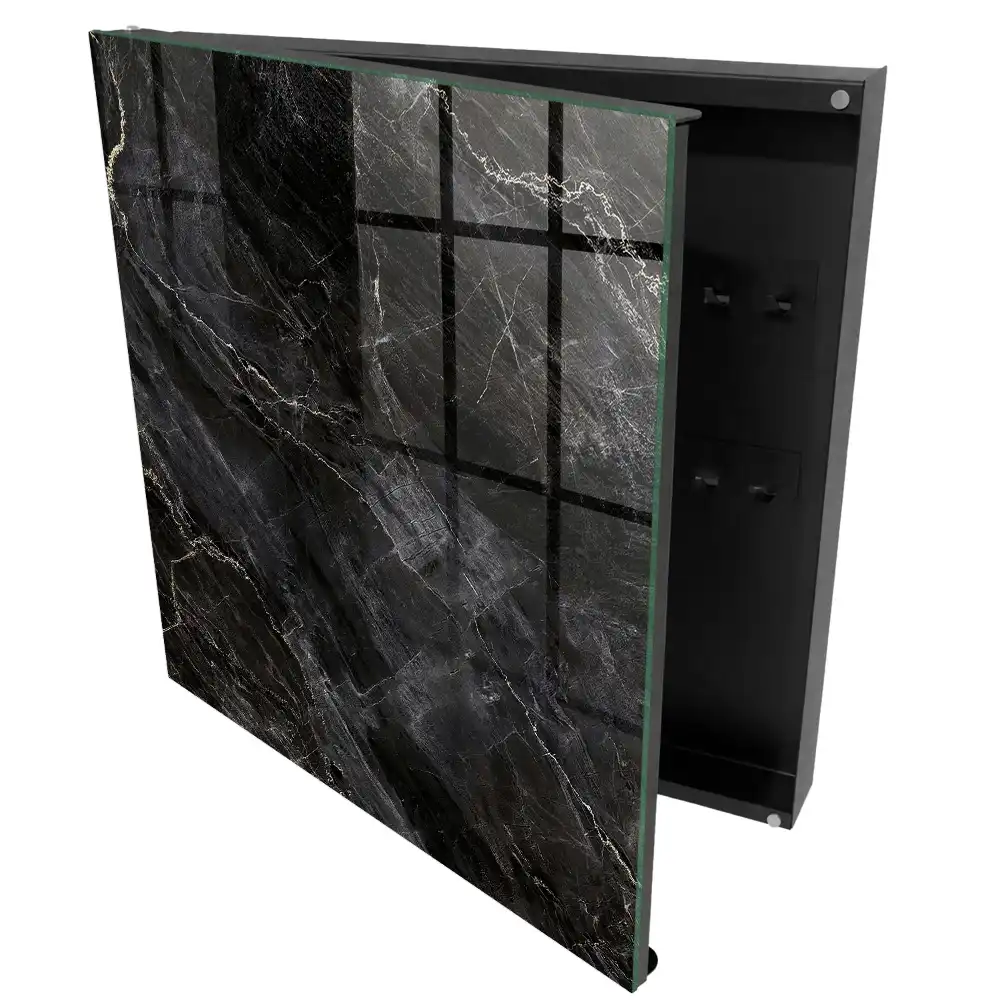Armoire à clés surface noire veinée de blanc évoquant le marbre